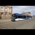 Blue-and-white tram in front of the Zwinger