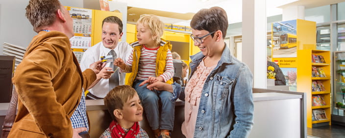 Photo of a family at a service point